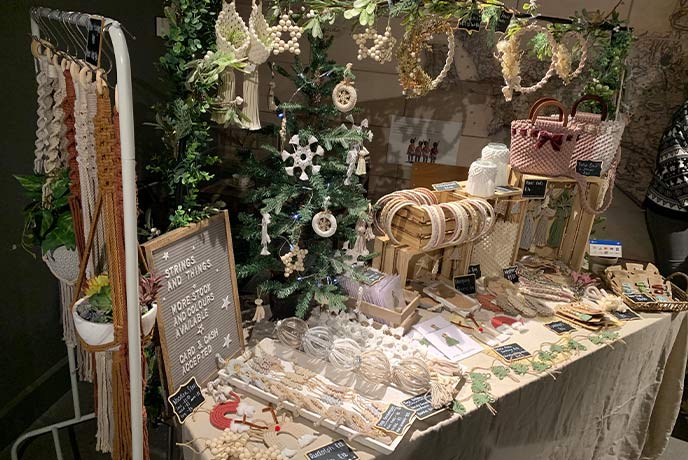 A stall covered in beautiful festive decorations at the Shire Hall Christmas Market