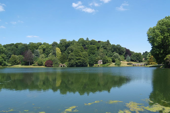 The beautiful Stourhead Lake near River Stour, one of the best bike rides in Dorset