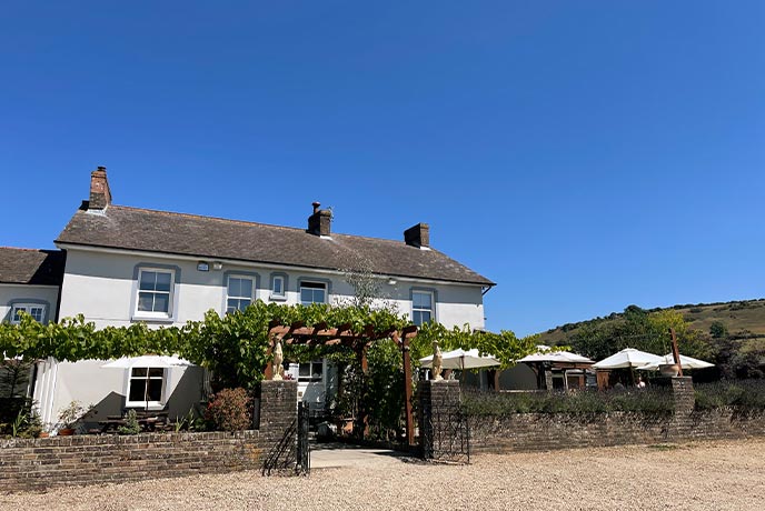 The traditional exterior of The Greyhound Inn in Dorset