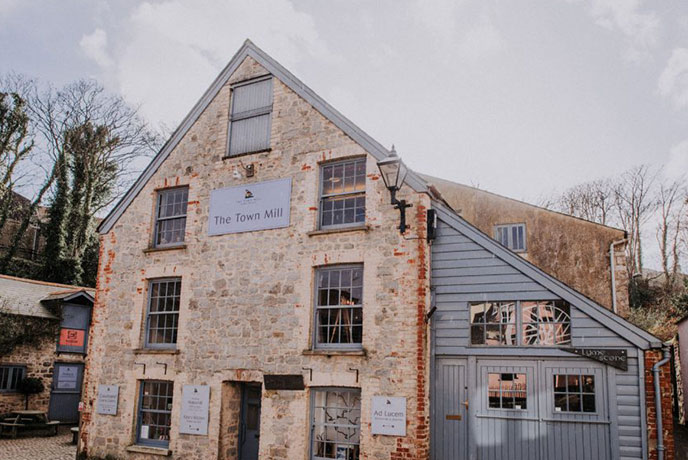 The beautiful old stone exterior of The Town Mill