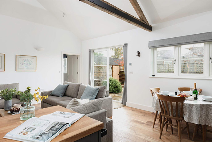 The bright and airy living are at The Cowshed in Wreath Farm