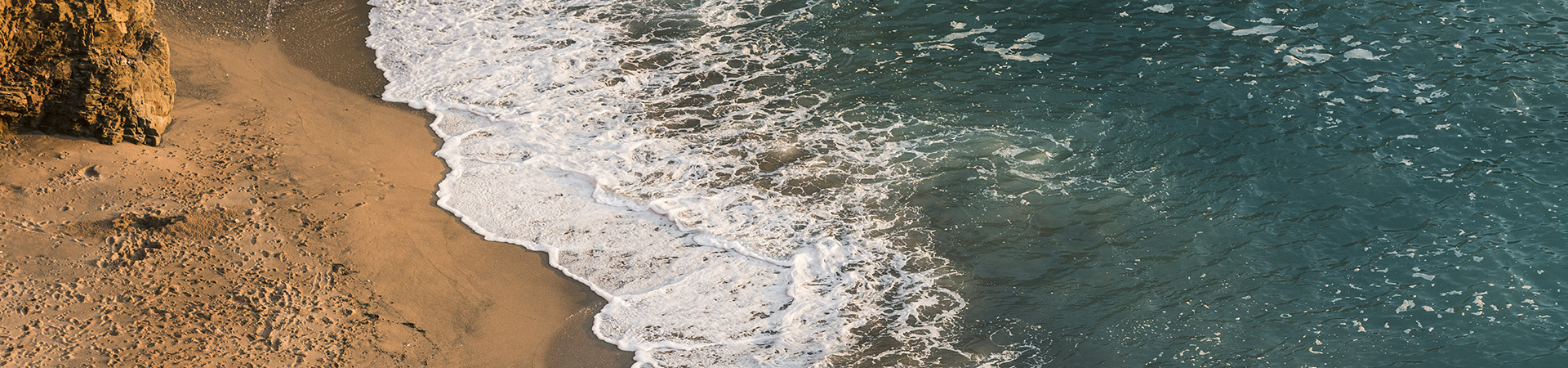 Holiday cottages by a beach in Carmarthenshire