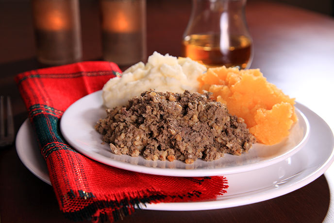 A plate of haggis, neeps, and tatties