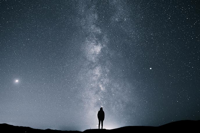 A person gazing at the Milky Way