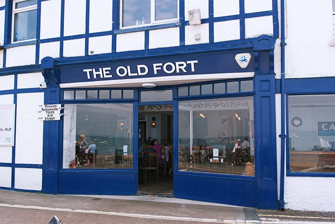 The blue and white exterior of The Old Fort restaurant in Seaview on the Isle of Wight