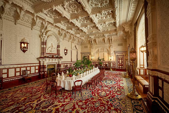 The impressive Durbar Room in which a huge and ornate dining table sits