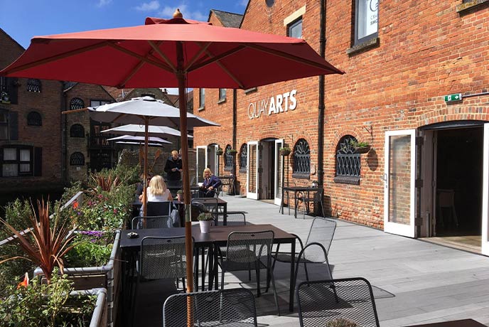 The red bricked exterior and outdoor seating area at Quay Arts on the Isle of Wight
