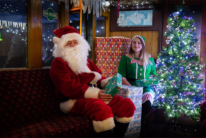 Santa waiting in the Christmas experience at Isle of Wight Steam Railway