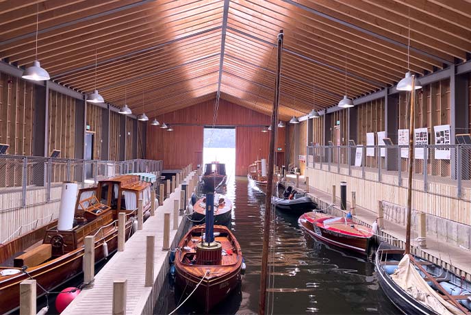 The impressive boat shed full of boats at the Windermere Jetty Museum in the Lake District