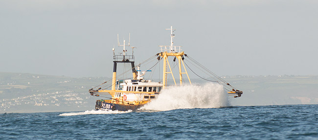 Newlyn trawler leaving mounts bay