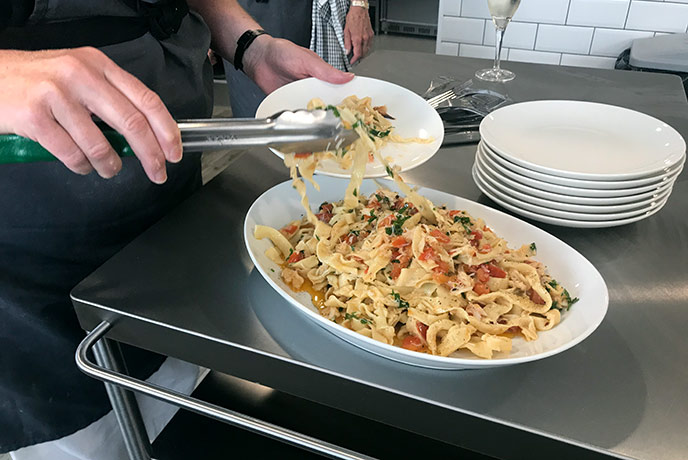 Tasting the delicious crab linguine made before our eyes.