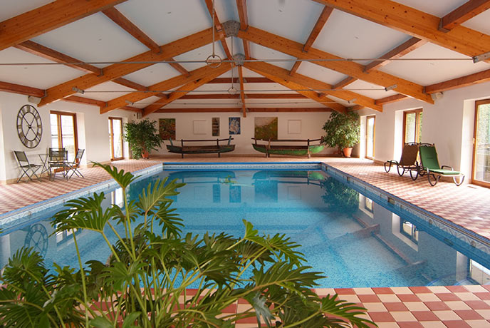 The Cottage has a pretty pool house shared between two properties.