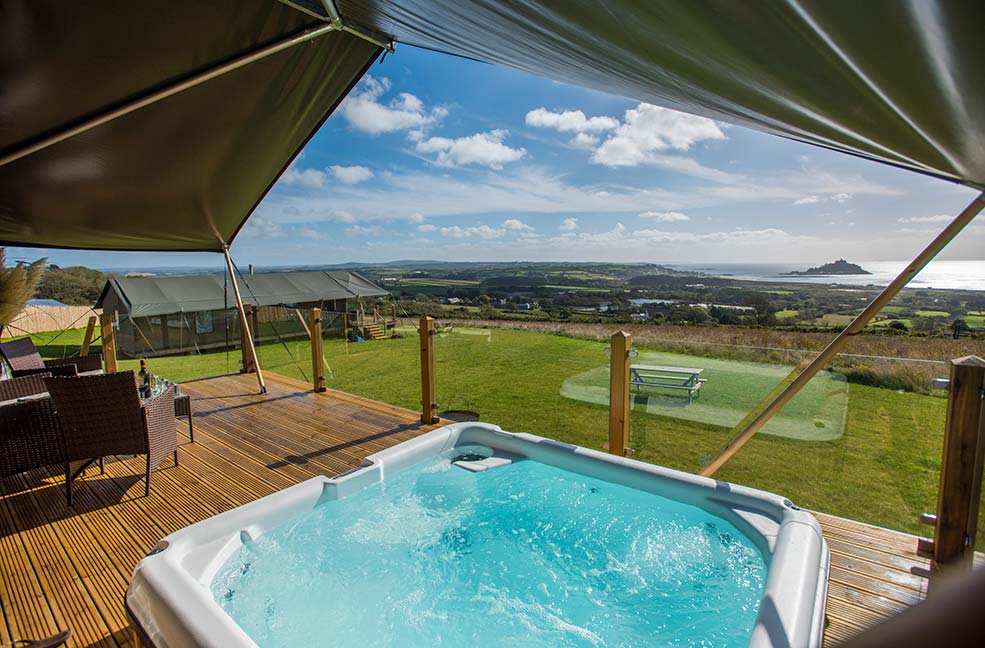 Relax in a hot tub overlooking St Michael's Mount at the Mount's View Retreat.