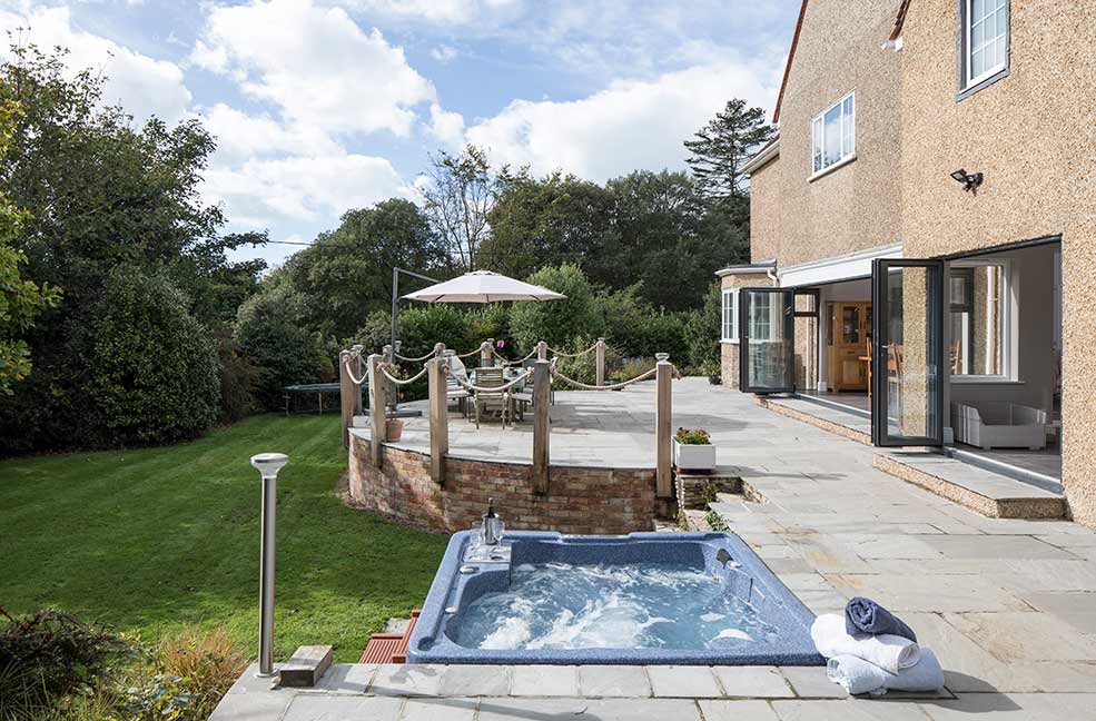 The bubbling hot tub at Ridge House will be your sanctuary after a long day of walking in Hampshire.