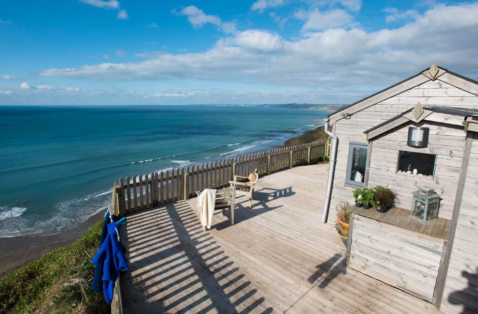 This 1930s cabin overlooks Whitsand Bay in Cornwall. Stay at Rockwater Cabin for the ultimate seaside glamping holiday.