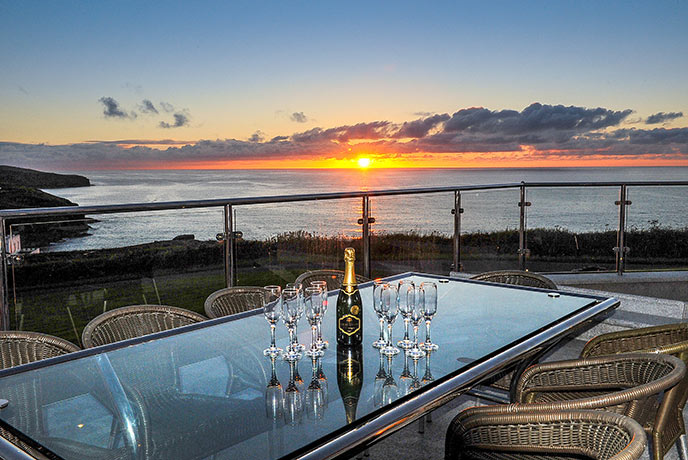 Watch the sun set over the horizon from the terrace at Silver Spray.