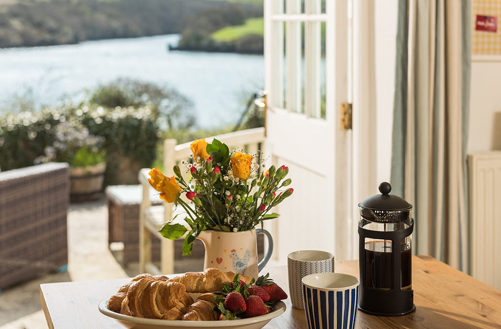 Beautiful views of the Helford river from the dining room of White Cottage.