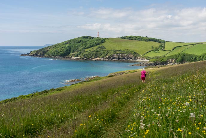 The view of Polridmouth beach from the coast path near Fowey in Cornwall.