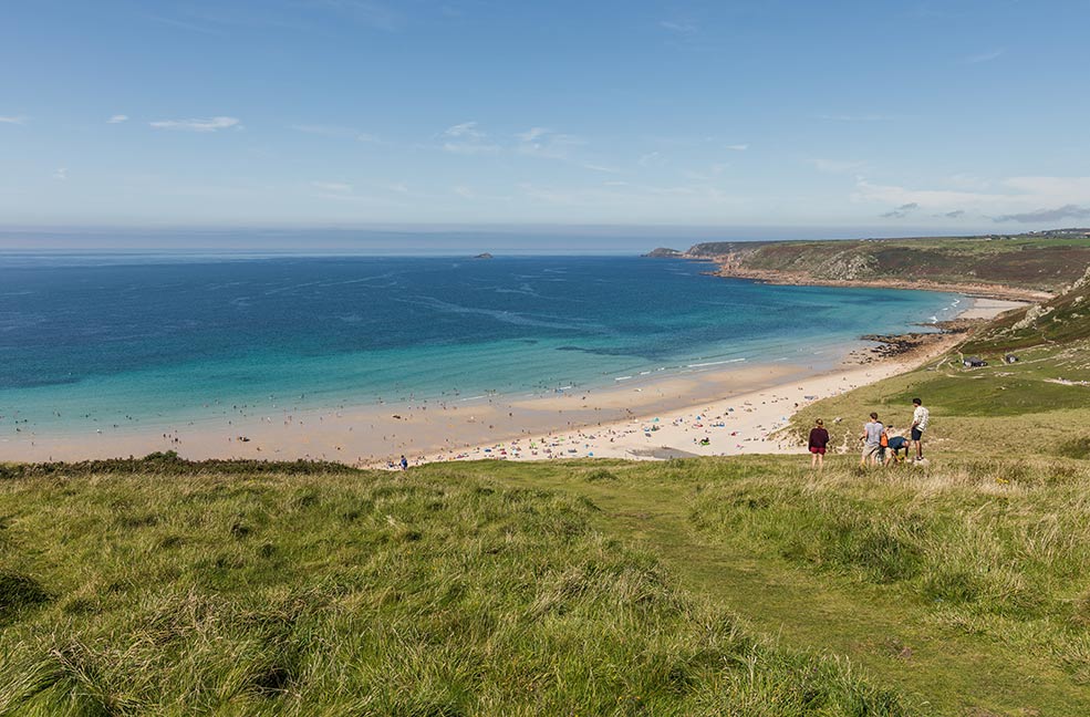 The beach at Sennen is a beautiful golden strip of sand that attracts surfers from around the world.