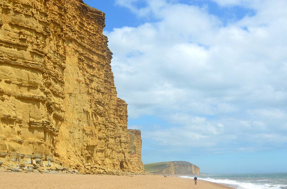 Stare out at the breathtaking views toward the Golden Cap from the beaches of West Bay.