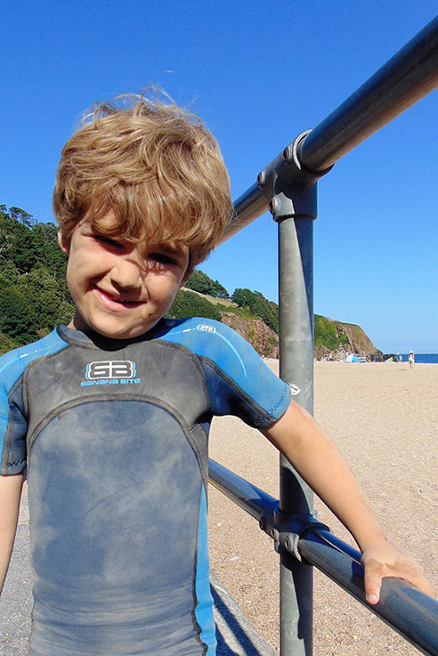 A very happy boy at Blackpool Sands in south Devon.