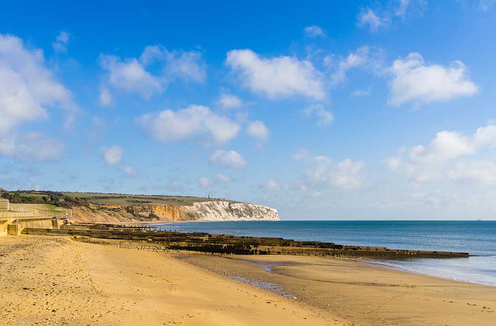 Culver cliffs stand tall next to the golden sands of Sandown.