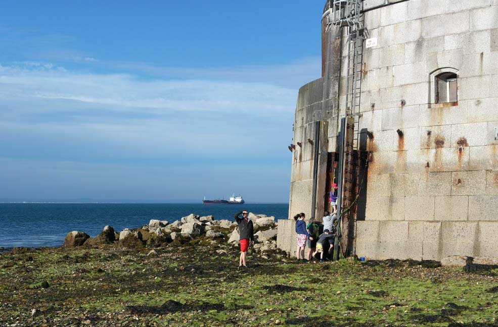 Climbing the ladder up on to St Helens Fort during the low spring tide.