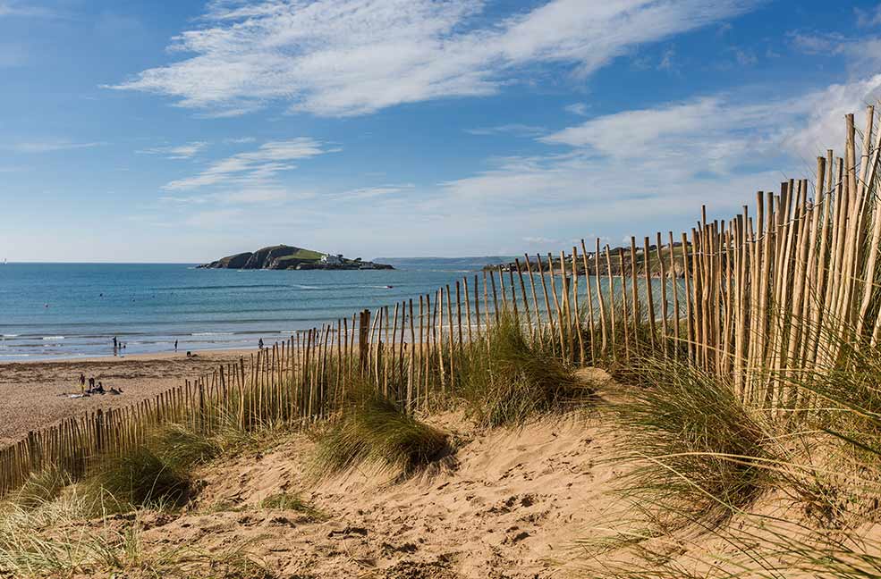 Play in the sand dunes at Bigbury on Sea.