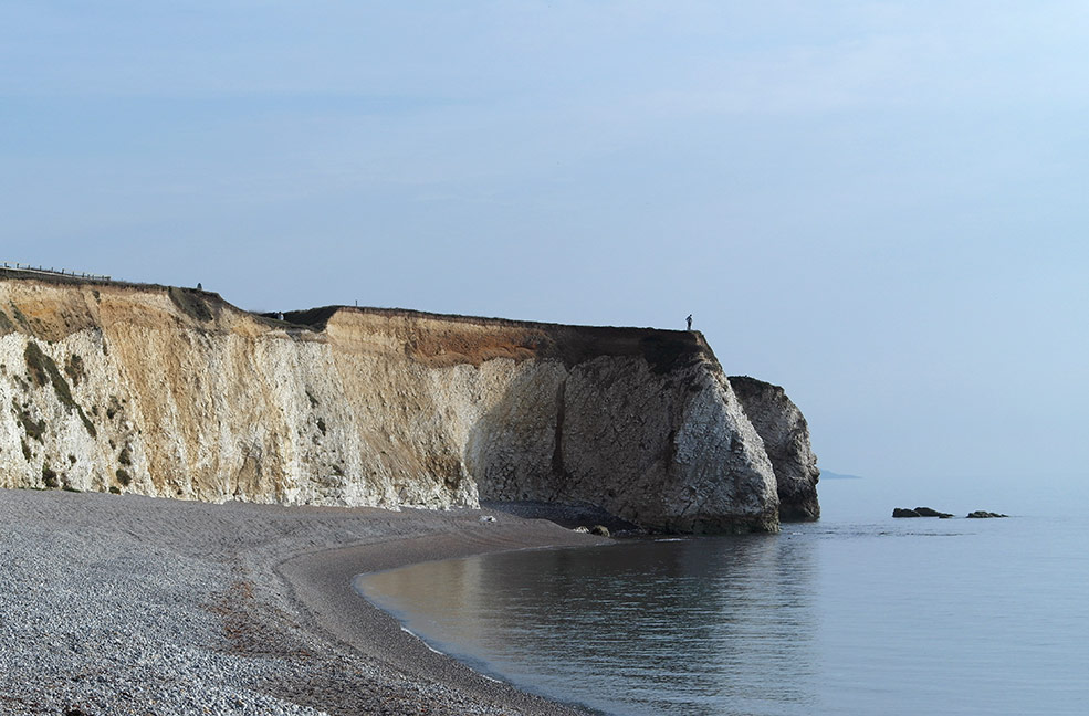 Freshwater Bay is a calm place to sit and watch the world go by on a sunny day on the Isle of Wight.