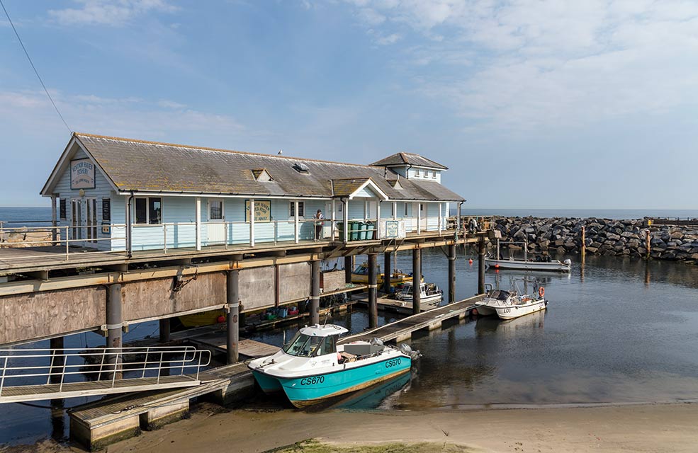 Ventnor Haven Fishery offers the local delicacy of crab and chips, perfect for those looking for a lighter seaside-themed lunch. Sit on the sea wall for the ultimate beach holiday experience.