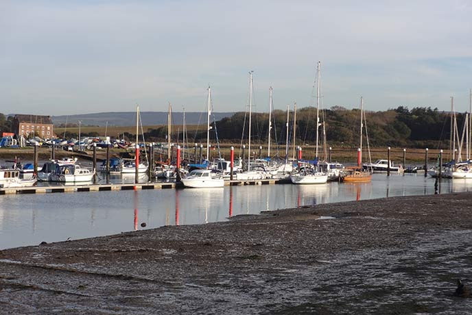 Boats bobbing in the marina at Yarmouth harbour.