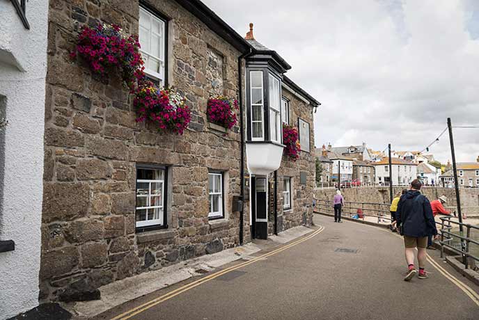 Taking a walk for a pint at the Ship Inn in Mousehole.