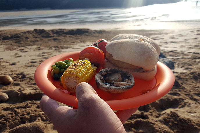 Enjoy a barbecue on the beach in Cornwall.