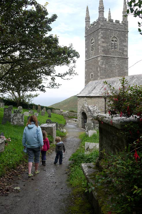 Ali and family look for the graves of the wreck victims buried by Rev Hawker in Church in Morwenstow