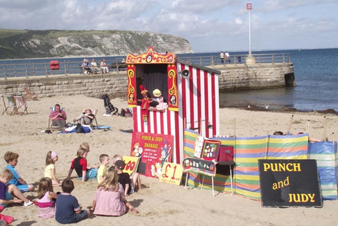 Watch some classic Punch and Judy on the front at Lyme Regis.