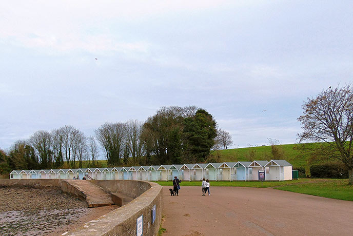 The pretty beach huts of Broadsands bay are a colourful addition to the winter months.