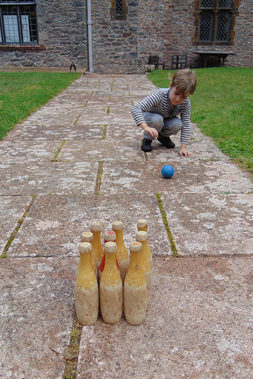 We had a go at playing skittles in the sunshine at Compton Castle, Devon.