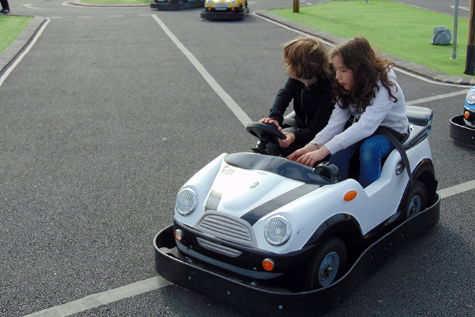Starting them learning to drive early on the Junior Driving School.