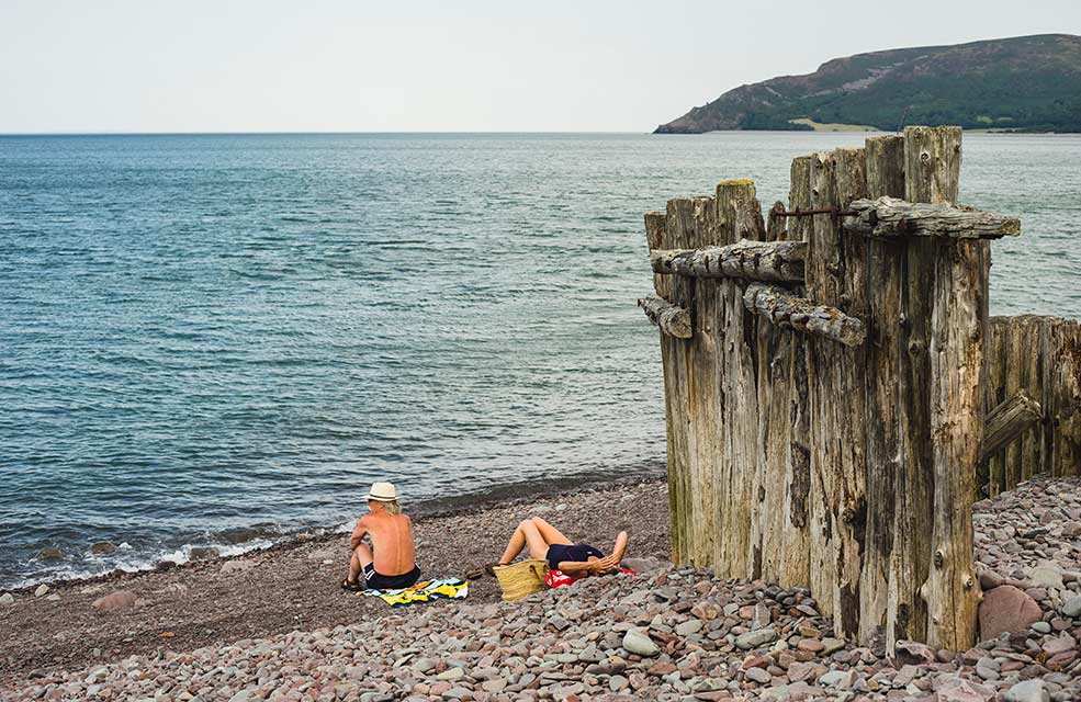 There always seems to be an abundance of sunbathers on the stones at Porlock Weir.