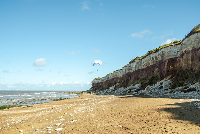 The dramatic cliffs and golden sands at Hunstanton along the North Norfolk coastline