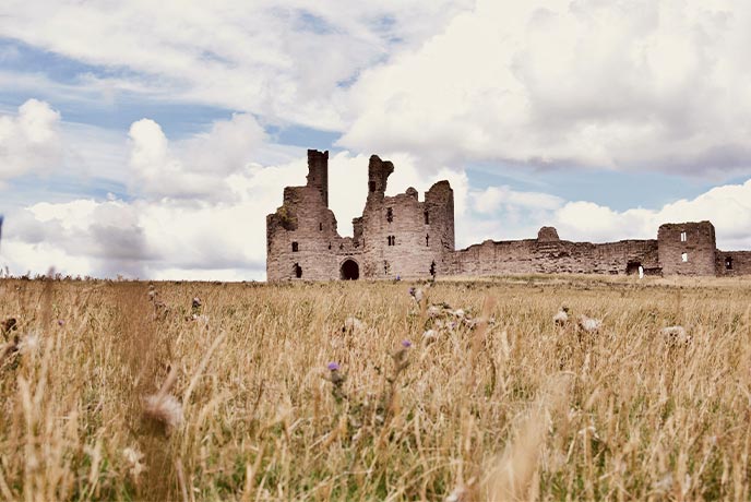 The impressive ruins of Dunstanburgh Castle in Northumberland