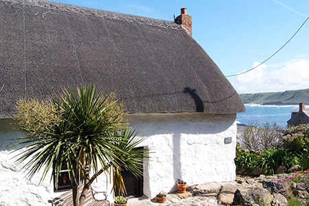 Little thatched Cornish cottages by the sea in Sennen Little thatched Cornish cottages by the sea in Sennen