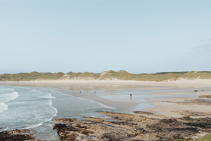The reaching golden sands and sand dunes of Balnakeil beach on the NC500 in Scotland