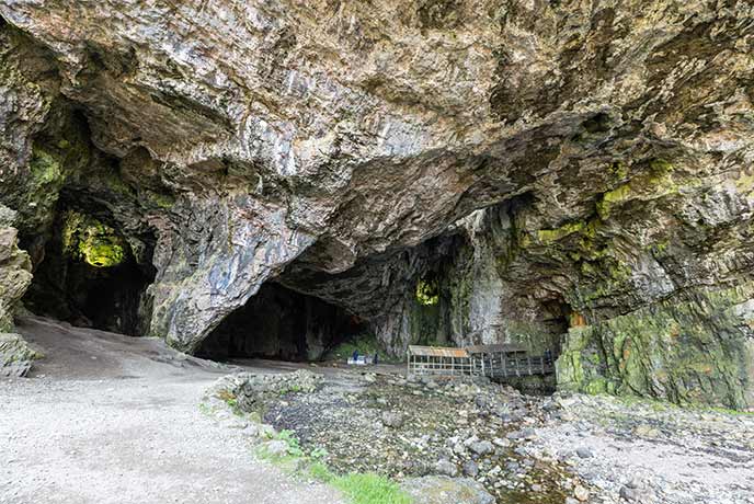 The giant entrance to Smoo Cave in Durness on the NC500