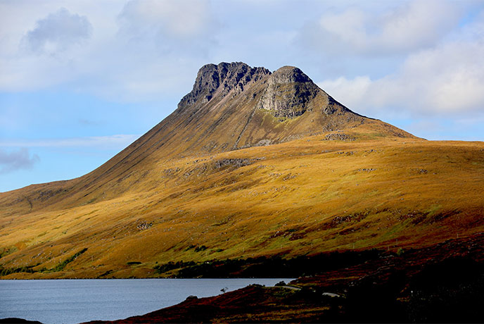 The towering peak of Stac Pollaidh in the Scottish Highlands