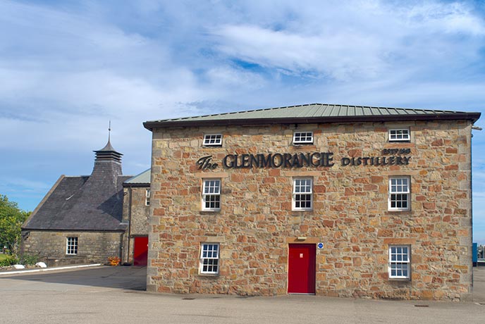 The stone exterior of the Glenmorangie Distillery in the Scottish Highlands