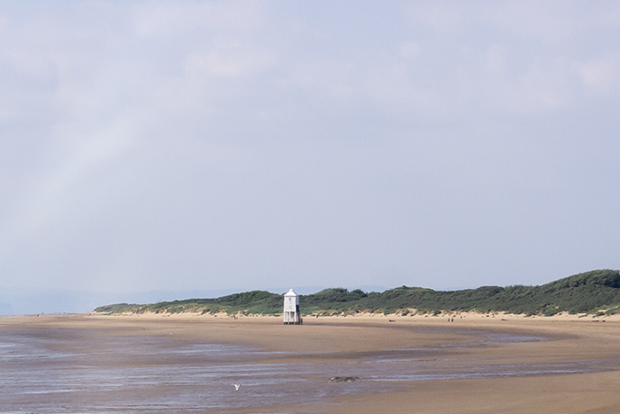 The stretching sands at Burnham-on-Sea with the Victorian watch tower in the distance