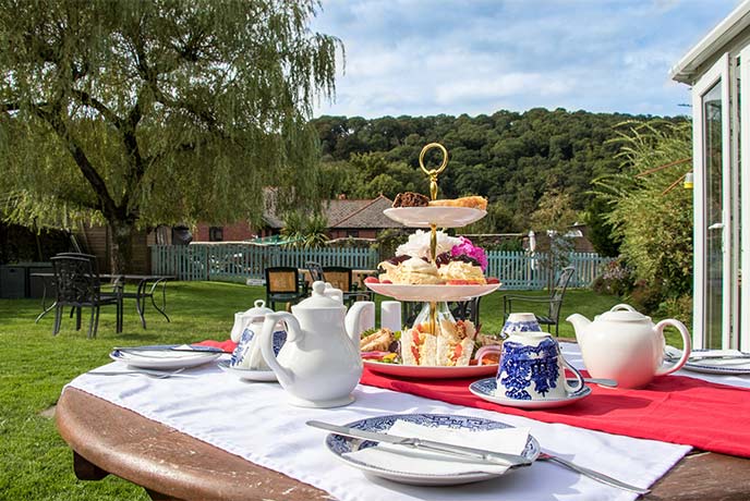 An afternoon tea served outside at The Copper Kettle in Somerset