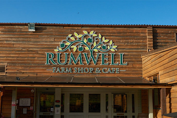 The wooden exterior of Rumwell Farm Shop in Somerset
