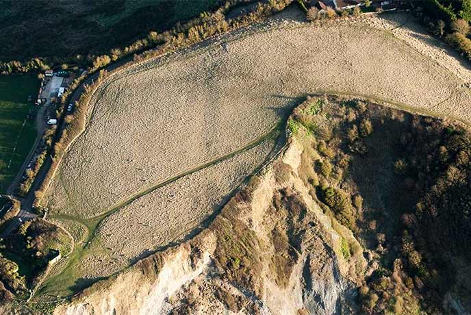A bird's eye view of the remains of Daws Castle in Somerset